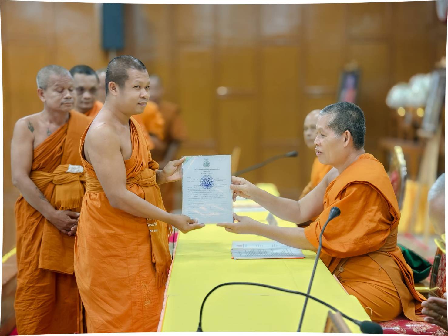 title - วันเสาร์ที่ 25 กรกฎาคม 2569 นายประเสริฐ กาญจนเกียรติกุล ปฏิรูปที่ดินจังหวัดบุรีรัมย์ พร้อมด้วยเจ้าหน้าที่ ส.ป.ก.บุรีรัมย์ มอบหนังสืออนุญาตให้ใช้ที่ดินเพื่อกิจการสาธารณูปโภค กรณีสำนักงานพระพุทธศาสนาแห่งชาติขอใช้ที่ดินเพื่อสร้างวัดจำนวน 7 วัด ในการประชุมคณะสงฆ์จังหวัดบุรีรัมย์ สมัยสามัญ ครั้งที่ 5 ปี 2569 ณ วัดกลาง พระอารามหลวง อำเภอเมืองบุรีรัมย์ จังหวัดบุรีรัมย์